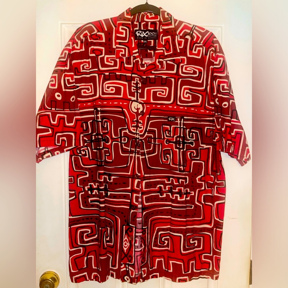 Rix XXL 100% cotton red and cream colored native design and motif.